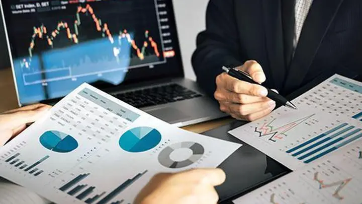 RBI policy day puts markets on edge as Nifty opens flat; oil slump, Wall Street records lift sentiment
