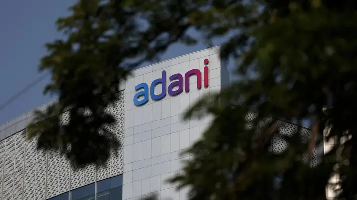 Adani group sells 5.5% stake in airports business, raises $1 billion