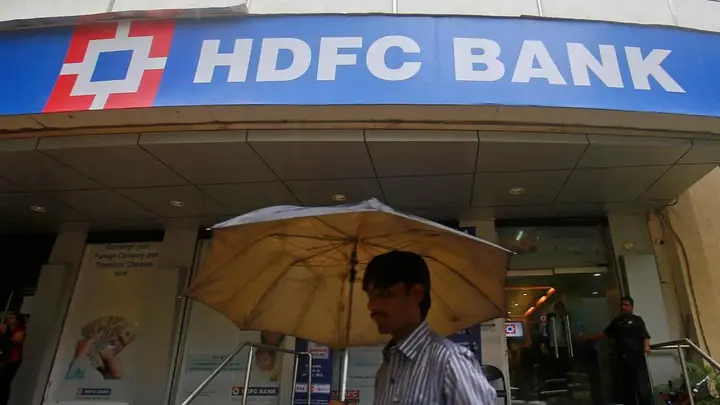 HDFC Bank shares shed early gains, end over 2% lower
